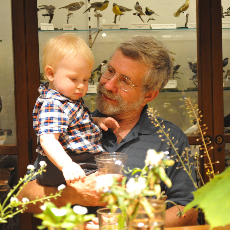 Father and son in museum at Wildflower Table